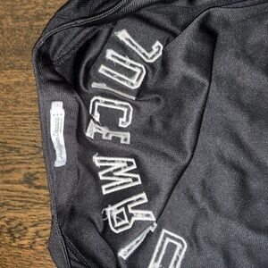 Black Men’s Football Jersey with White Lettering